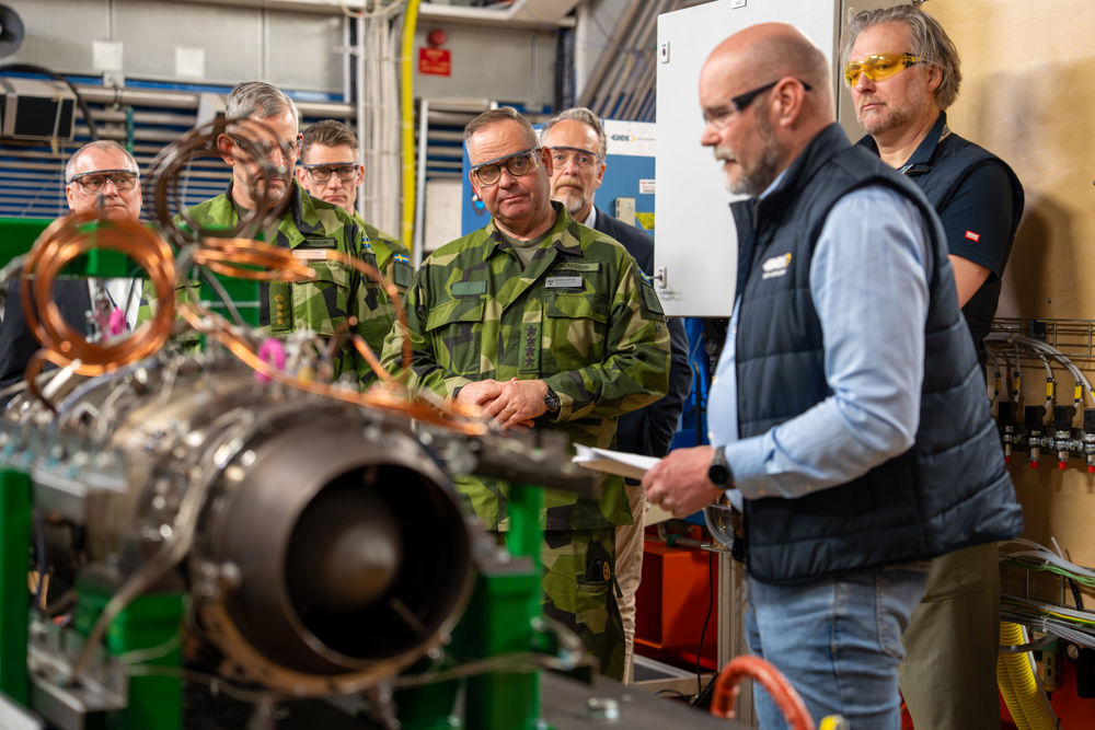 People at GKN Aerospace inspecting an engine